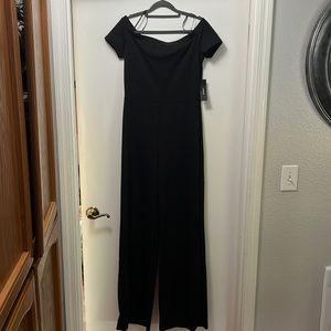Selling a large, black, off the shoulder/wide leg jumpsuit.